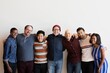© Rawpixel.com - Diverse group of men and women smiling, standing and hugging. Men and women group, diverse friends, smiling and standing together. Happy group of diverse friends, arms around each other together