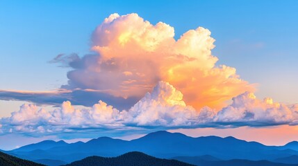 Wall Mural - dramatic clouds glow with golden light at sunset, casting warmth over the serene mountain landscape 