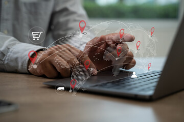 Fototapete - logistic import export man is using a laptop with a map of the world on the screen logistics and tra