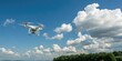 © Janmo - Cloud-shaped drone flying in the sky, remote sensing, flying device, cloud technology