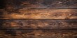 © Rasim - Dark brown wooden textured background with ample copy space, arranged horizontally, showcasing natural wood grain and rustic finish.
