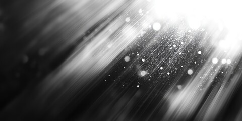 Poster - Abstract black and white background featuring blurred light rays and glowing bokeh effects with a smooth transition from dark to light at the center