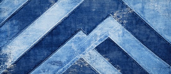 Fototapete - Distressed denim texture background with chevrons and stripes in varying shades of blue, ideal for card design and creative artwork.