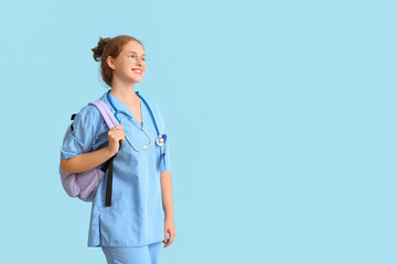 Poster - Female medical student with backpack on blue background