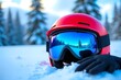 © SnapScape - Red helmet and goggles in snowy landscape