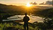 © hazia - Farmer sunset rice terrace view contemplation