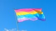 © Harry - Lesbian, gay, bisexual, and transgender pride flag waving proudly, symbolizing inclusivity, equality, and LGBTQ+ rights, perfect for celebrating diversity and unity