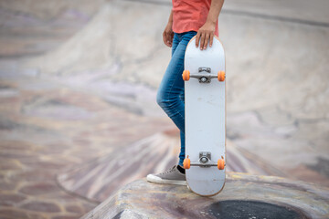 Skateboarder skateboarding at skatepark in city