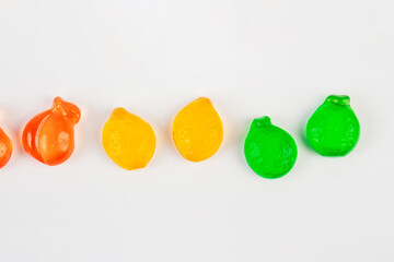 Assorted gummy candies, Juicy colorful jelly sweets. Gummy candies on white background