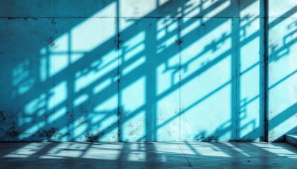 Poster - Abstract blue wall with geometric shadows in sunlight