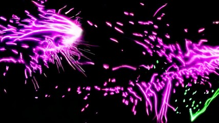 Leinwandbilder - Colorful sparks burst during a nighttime celebration showcasing dynamic light effects and energy in a vibrant display