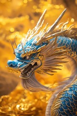 Poster - A statue of a blue dragon set against a gold background, perfect for use in fantasy or mythical scenarios