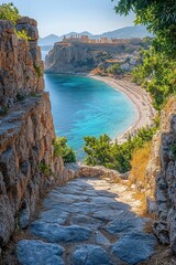 Wall Mural - A scenic shot of a stone path leading to a beach next to the ocean