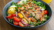 © siraphol - Grilled chicken salad with fresh vegetables and herbs in bowl
