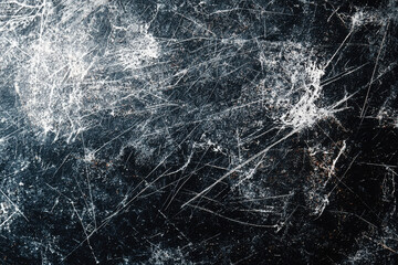 Poster - Overlapping scratches and scuffs form a high-quality abstract grunge pattern on a dark black background with faint cracks