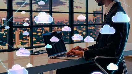Poster - Working late on a laptop with cloud technology visuals in a modern office at sunset in a bustling city