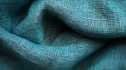 Poster - Close-up of textured teal fabric with folds and wrinkles showing intricate weave.