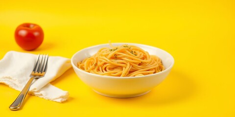 Delicious bowl of spaghetti on bright yellow background with copyspace, yellow background, meal, space