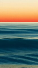 Poster - Gentle ocean waves rippling across calm waters, reflecting warm orange sunset hues through minimalist photographic frames capturing serene maritime landscape