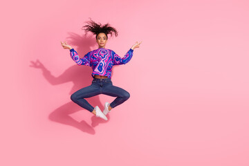 Wall Mural - Full length photo of cheerful pretty lady dressed retro sweatshirt jumping high enjoy yoga empty space isolated pink color background