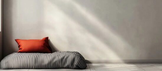 Poster - Modern bedroom interior featuring a red pillow on striped bedding with minimalist design and ample empty wall space for customization.