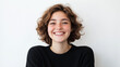 © Helga - Close-up portrait of a young, smiling woman on a white background, capturing her bright and infectious smile that expresses happiness and joy. young woman, portrait photography, sm