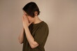 © Yuliia - Cute beautiful girl folded her hands in prayer. A woman asks God for help.