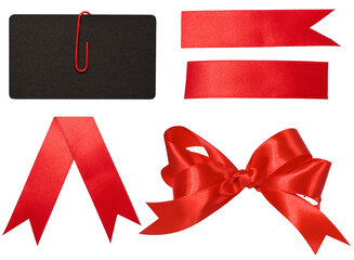 Wall Mural - Red silk ribbon bow, black blank business card and ribbon on isolated background. Gift decor set