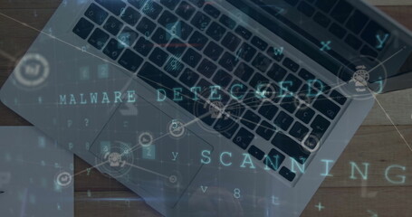 Poster - Image of malware detected text with network and data processing over laptop on desk