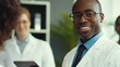 © Alexander Chaykin - Smiling Doctor with Pocket Notebook