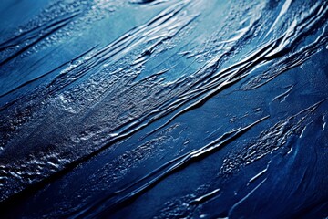Poster - Abstract close-up of textured blue surface showcasing ripples and grooves for artistic and creative backgrounds in various design projects