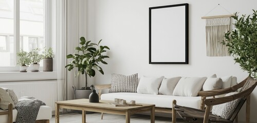 Fototapete - Living area with a black poster frame, white sofa, and a wooden coffee table under minimal decor.