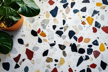 Poster - Modern terrazzo background featuring colorful fragments and stylish lighting for creative interior spaces