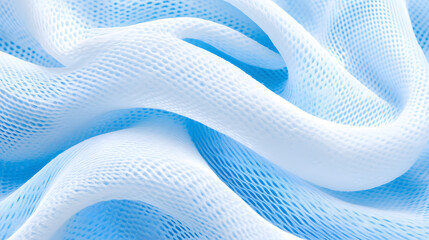 Poster - Soft blue fabric drapes elegantly in waves, showcasing texture and color variations