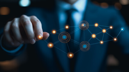 Poster - businessman interacting with a futuristic network interface.  His fingertip touches a glowing node, illustrating connection and control