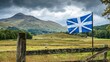 © phy - A rural scene in Scotland, with the national flag and the rugged Scottish landscape representing independence and heritage.