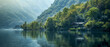 © IonelV - Beautiful lake with house in the background, water is calm and the trees are lush and green