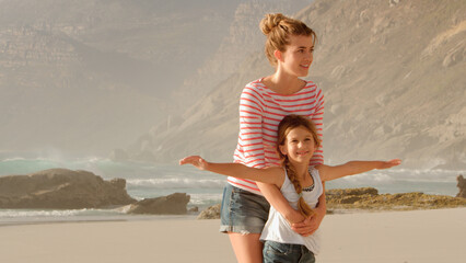 Wall Mural - Mother And Daughter On Summer Vacation Playing On Beach Together