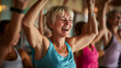© Natalia Klenova - Middle-aged Woman Enjoying Group Fitness Class