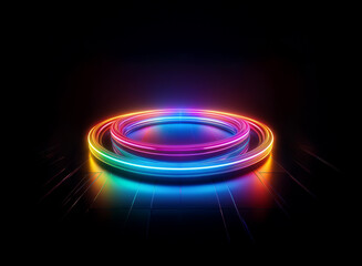 Aufkleber - Vibrant, multicolored neon rings illuminate a dark, reflective surface, creating a futuristic, circular stage.  The glowing circles cast colorful reflections, suggesting a dynamic energy.