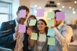 © stockimgahnaf - Office workers employees doing teamwork with sticky notes and making strategies