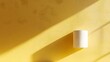 © horizon - Toilet paper roll positioned against pale yellow backdrop showcases textured paper detail with right-aligned placement and soft shadow effects.