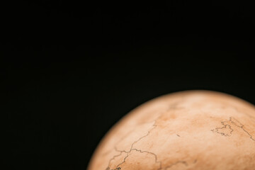 Wall Mural - A close up of a planet with a black background