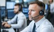 © underground - Focused call center agent, office, teamwork, problem-solving.  Use website, article.