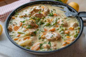 Wall Mural - Easy homemade one pan creamy chicken breast with vegetables in a frying pan