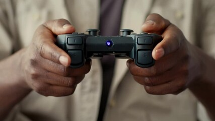 Aufkleber - a young african american man focuses on his gaming while holding a console controller. surrounding h