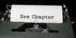 © cff999 - new chapter - a typewriter with the word new chapter written on it
