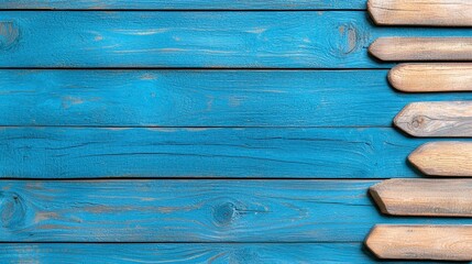 Close-up view of a blue wood plank on a rustic wooden background texture