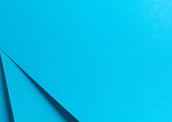 Poster - Blue paper background with a smooth matte finish and sharp geometric edges. Delicate pastel tones and vibrant contrasts create a polished, elegant, and contemporary design with a harmonious and