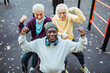 © Marko Geber - Senior men flexing muscles at outdoor park gym